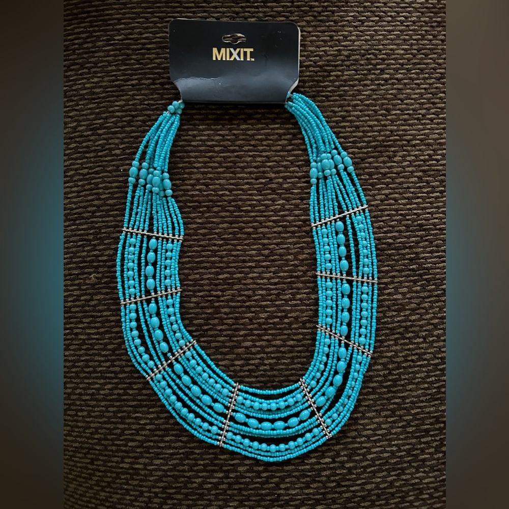 *3/$25* New Mixit brand turquoise and silver beaded necklace. Has silver clasps.